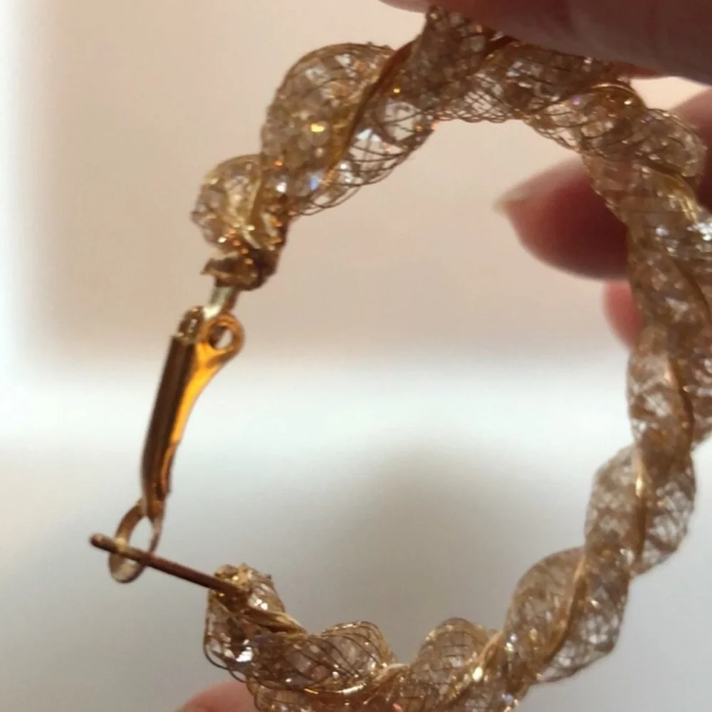 Spiral twist hoop earrings for pierced ears